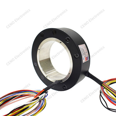 Bague de glissement traversante pour une transmission rotative fiable de puissance et de signaux
